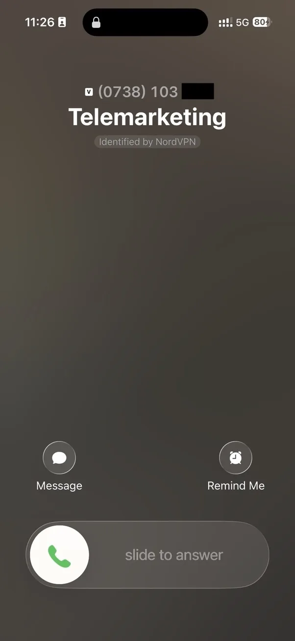 NordVPN Scam Call Protection marchează un apel ca Telemarketing pe iPhone